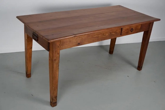Image 1 of Early 20th-century French rustic country dining table made of fruitwood