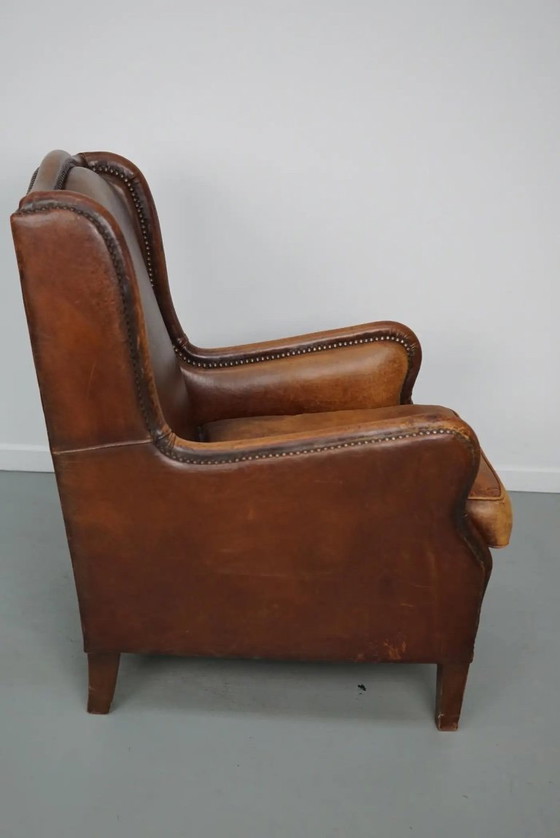 Image 1 of Vintage Nederlandse clubfauteuil van cognackleurig leer