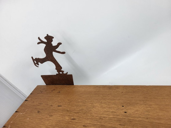 Image 1 of Mensola in legno e metallo decorata con pattinatori sul ghiaccio