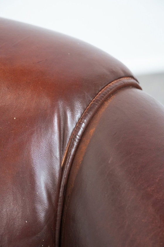 Image 1 of 2 x Vintage schapenleren clubfauteuil met siernagels 