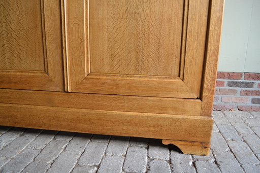 Large sleek antique oak wood Louis Philippe cabinet.