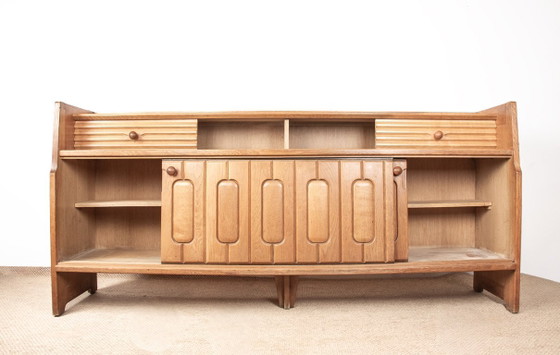 Image 1 of Large sideboard in oak and Danikowski ceramics, by Guillerme and Chambron, 1960.