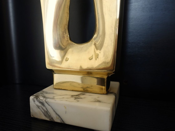 Image 1 of Sculpture en laiton poli d'après Gérard Koch.