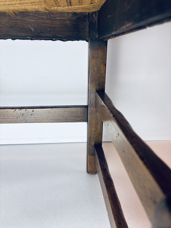 Image 1 of 🪑 Vintage eikenhouten armstoel met origineel leren bekleding (1920–1950)