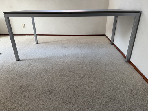 Tavolo Metaform modello S16, piano in Pietra Serena 20mm