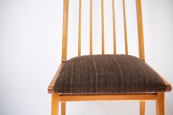 Image 1 of Slim wooden chair with brown upholstery