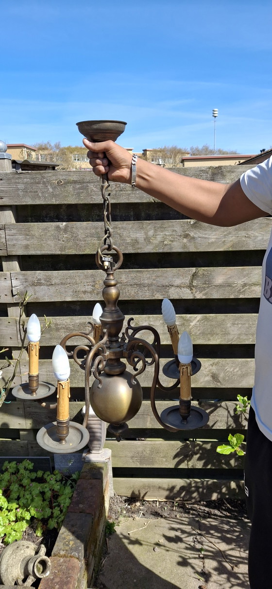 Image 1 of Pesante corona antica in bronzo.