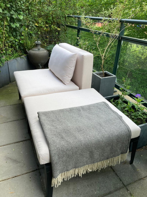 Hagelnieuwe (buiten) lounge stoel met poef