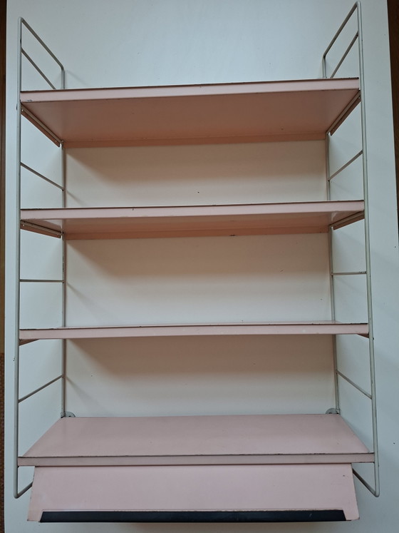 Image 1 of Raro estante de pared con la marca Tomado Holland