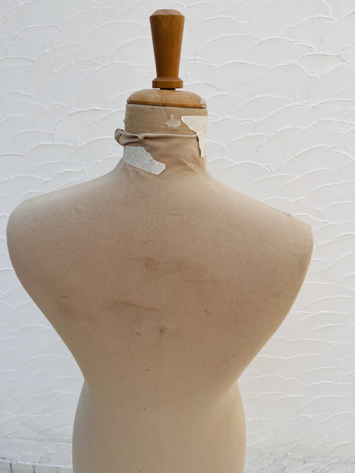 Mannequin on metal stand