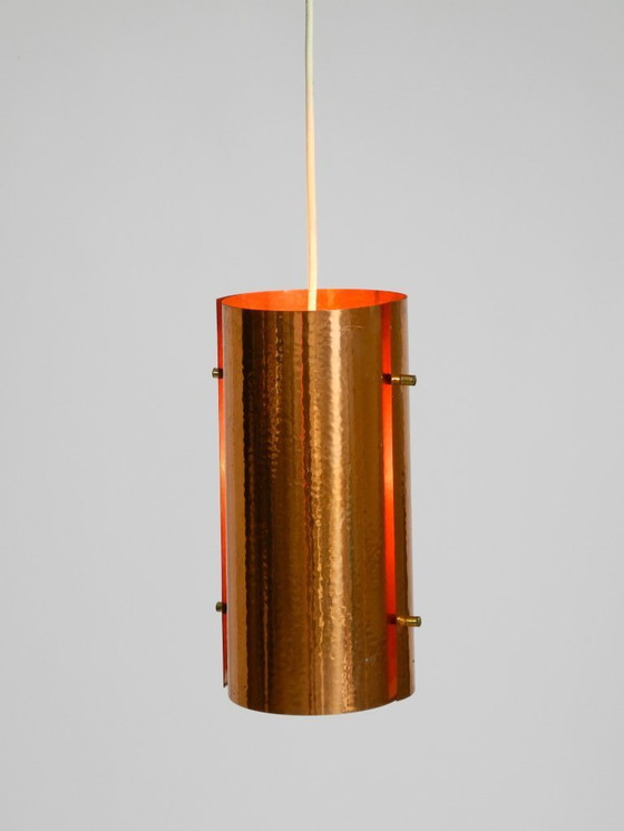 Image 1 of Two rare mid-century tube pendant lamps consisting of two screwed-together copper bowls