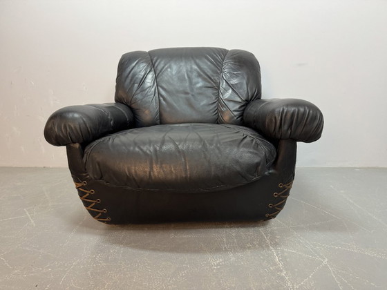 Image 1 of Beautiful Big Black Leather Postmodern Italian Design Space Age Lounge Chair with Brass Buttons and Playful Cord Lacing, 1970s.