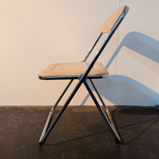 1x Chaise pliante Plia en similicuir crème rare
