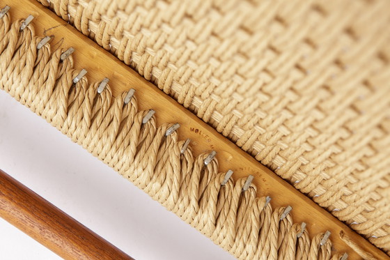 Image 1 of 1 di 2 Poltrona n. 56 di Niels Otto Møller (1954) – Struttura in teak, cordoncino di carta danese rinnovato, 2 disponibili, sped