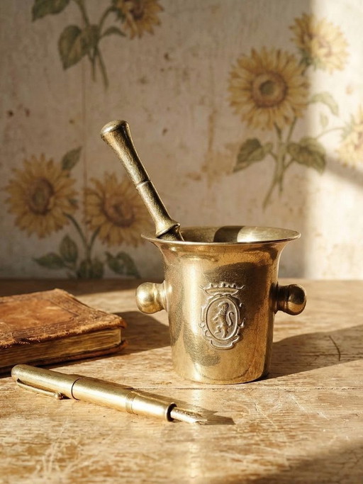 Gilt bronze apothecary's mortar and pestle with heraldic decoration, 20th century