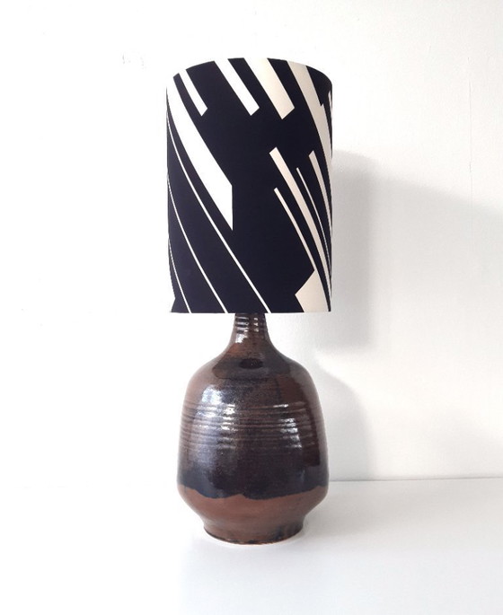 Image 1 of Sturdy dark brown ceramic Rheinfelden lamp base with new handmade lampshade of black and white graphic fabric