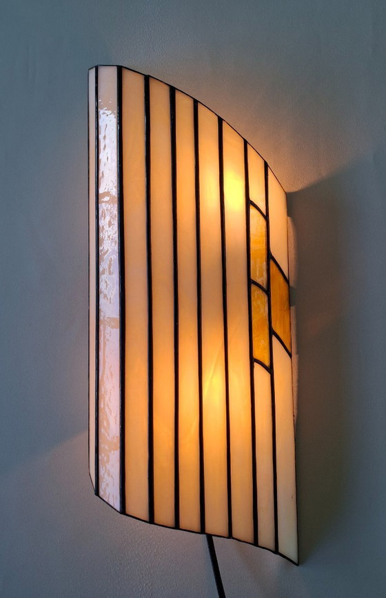 Image 1 of Tiffany  wandlamp met gekleurd glas in zwart koperband  Art Deco
