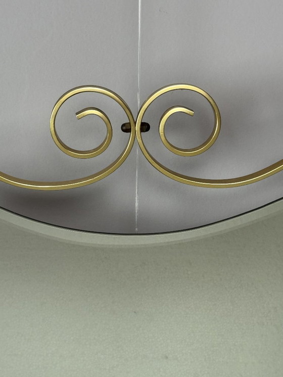 Image 1 of Grande specchio vintage con elegante cornice in ottone e vetro sfaccettato a forma libera, anni '60.