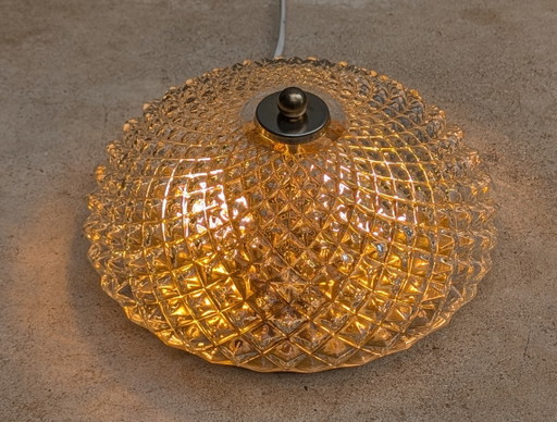 Ceiling light with a gold appearance