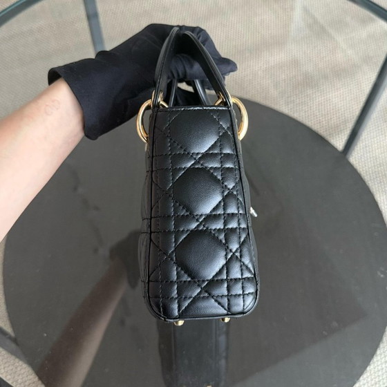 Image 1 of DIOR LADY MINI - PELLE DI AGNELLO CANNAGE, DETTAGLI IN ORO NERO, CINTURINO REGOLABILE
