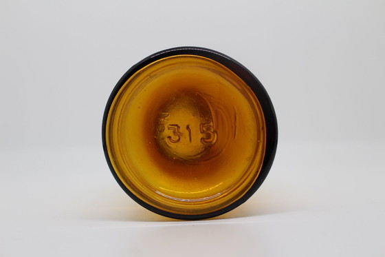 Image 1 of Bernsteinfarbene Apothekerflasche aus geschwefeltem Glas