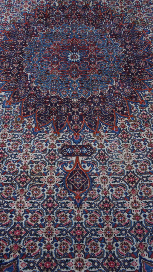 Grand tapis d'Orient bleu noué à la main 343x223cm