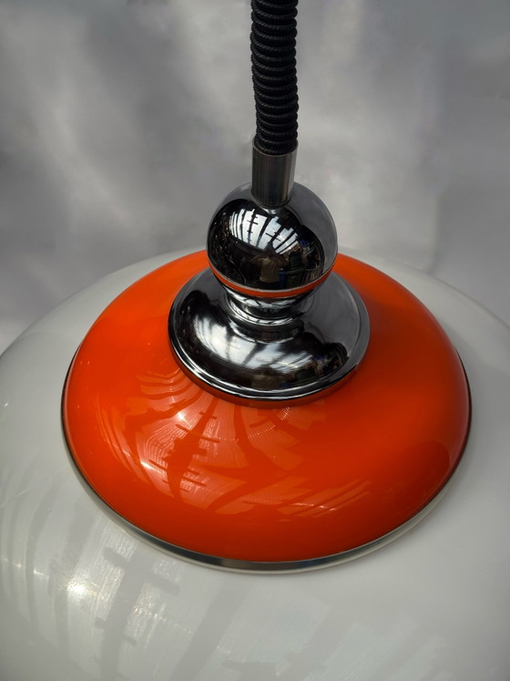 Image 1 of Vintage hanglamp in oranje en wit, in ruimtetijdstijl | Verstelbare hoogte | jaren 70