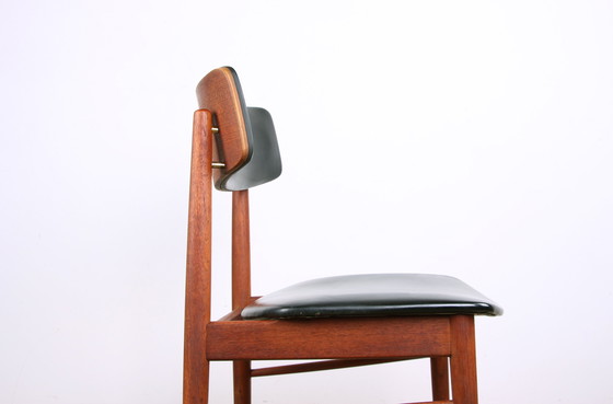 Image 1 of Juego de ocho sillas danesas de teca, polipiel negra y latón de Sven Chrobat para Sax, 1960