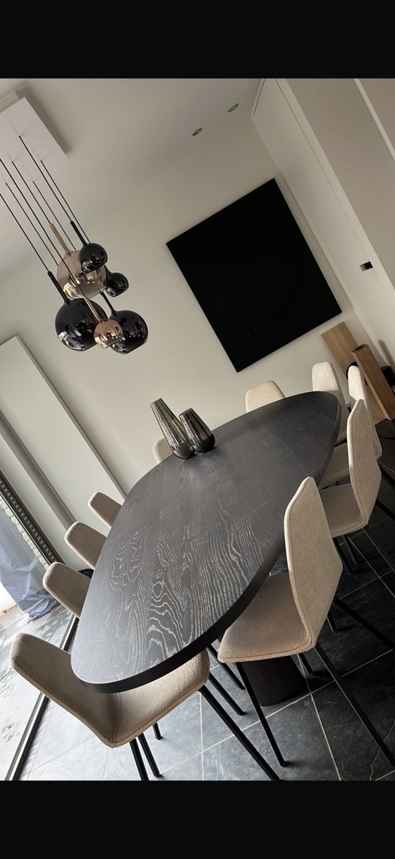Image 1 of Teardrop-shaped table
