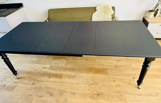 Image 1 of Eichholtz coulissen tafel (mat zwart)