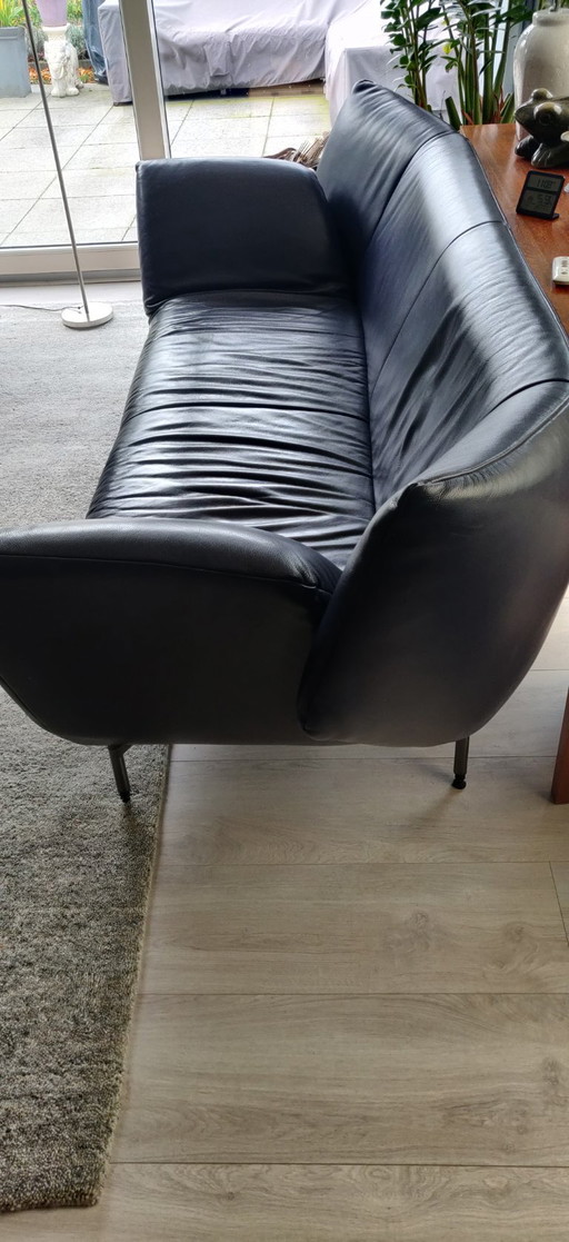 Lederen 2.5 zitsbank (2x) in een verfijnde paarse tint  