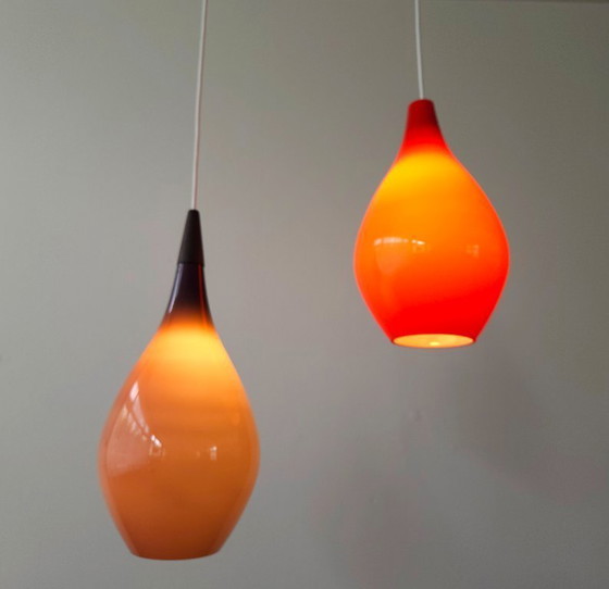 Image 1 of Drop glass mcm pendant lamp, white opal glass with purple top coat, scandinavian design