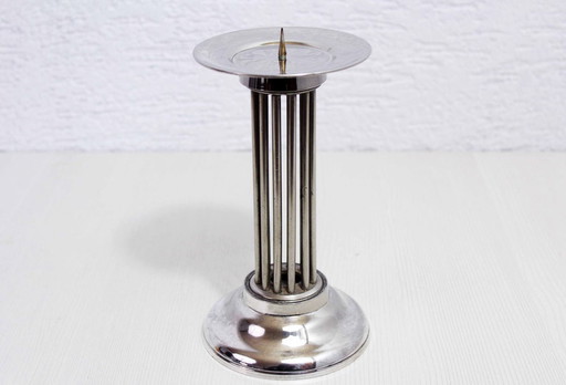 Candelabro moderno en metal plateado