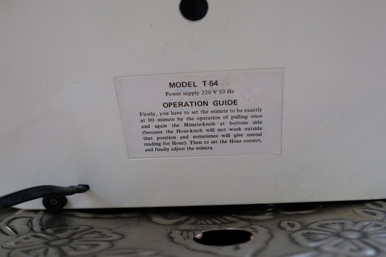 Image 1 of Originele Twemco Flip Clock – Model T-54 (ca. 1976–1985) Iconische elektromechanische designklok – volledig origineel