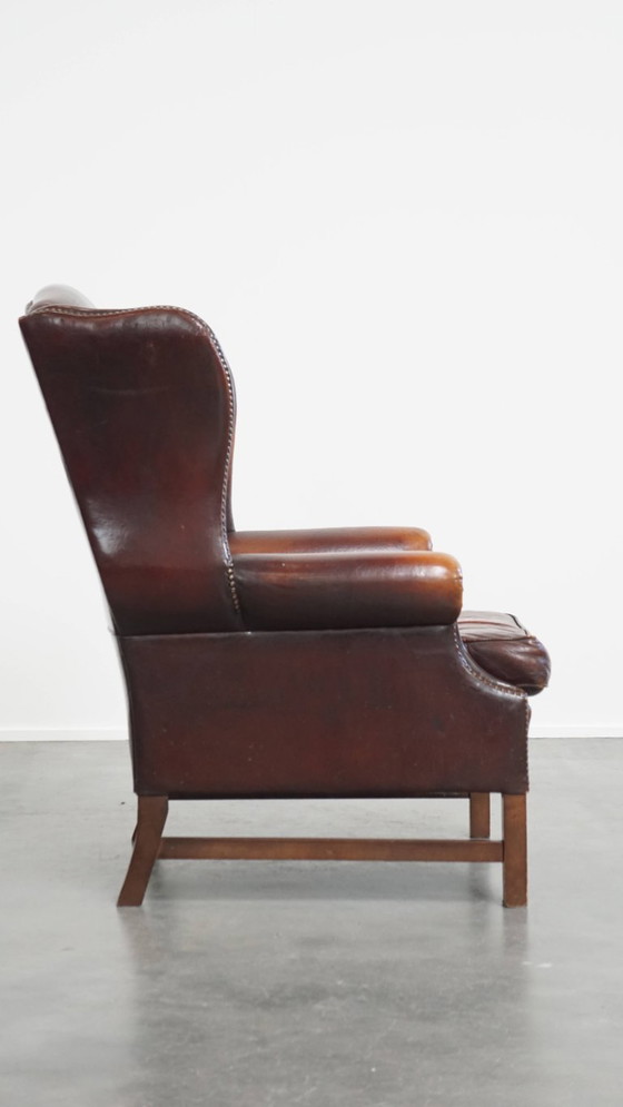 Image 1 of Donkere Engelse stijl schapenleren oorfauteuil