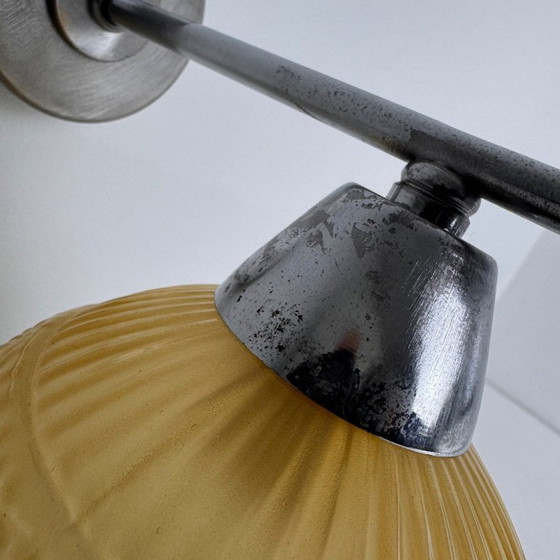 Image 1 of PAAR VINTAGE AMBERKLEURIGE WANDLAMPEN