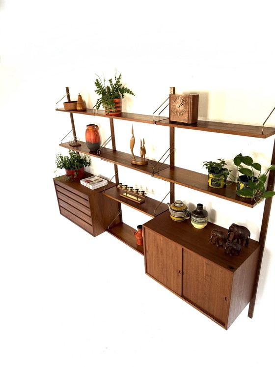 Vintage modulair teakhouten wandsysteem, Poul Cadovius ‘60 – Wandkast, Wood, Brass (photo 10 of 15)