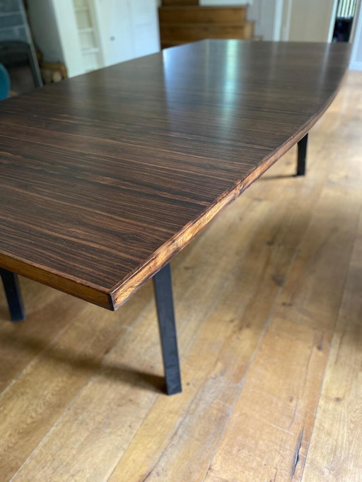 Mid - Century rosewood veneer dining table with steel legs