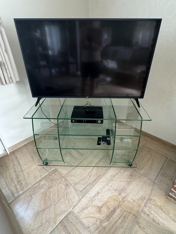 Image 1 of glass TV table