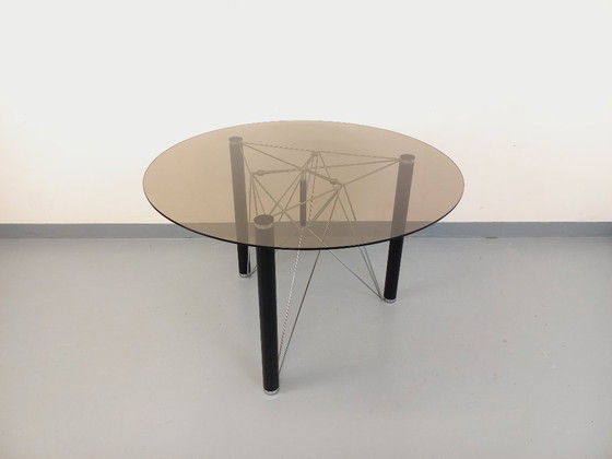 Image 1 of Vintage round dining table in smoked glass, black metal and chrome metal from the 80s
