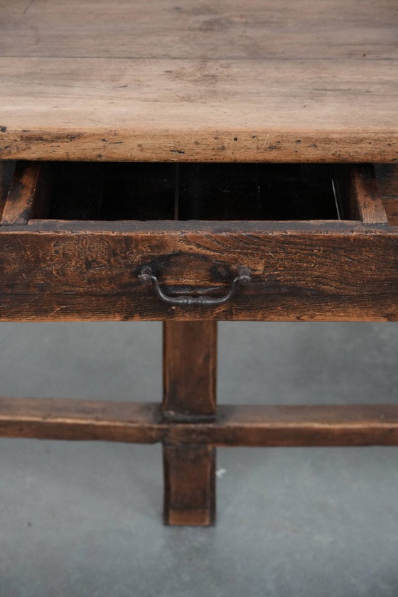 Image 1 of Robust antique French 6-person dining table made of fruit wood with 3 drawers from the late 18th century