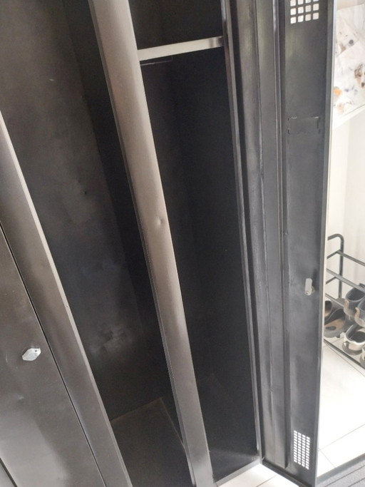 Vintage locker, old 2-door metal wardrobe, clothes rack