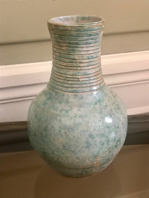 Turquoise glazed terracotta vase