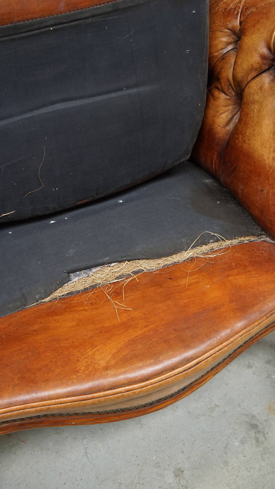 Image 1 of Antieke Schapenleren Chesterfield Fauteuil