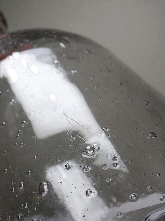 Image 1 of Large antique bottle in blown glass with bubbles, early 20th century, 1900-1920
