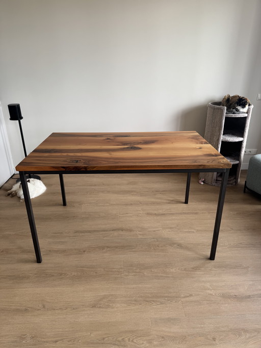 Table with walnut wood top.