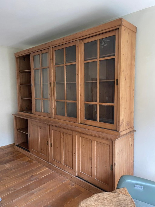 Antique cabinet with blown glass