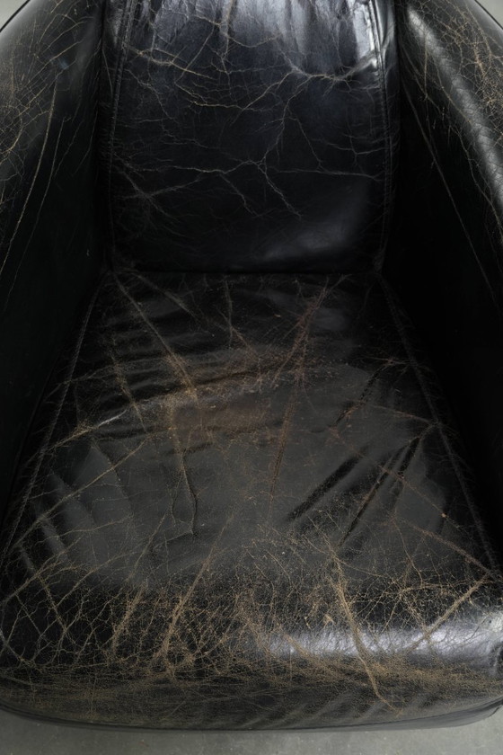 Image 1 of 2x rugged black vintage cowhide Aviator design armchairs with a distinctive look