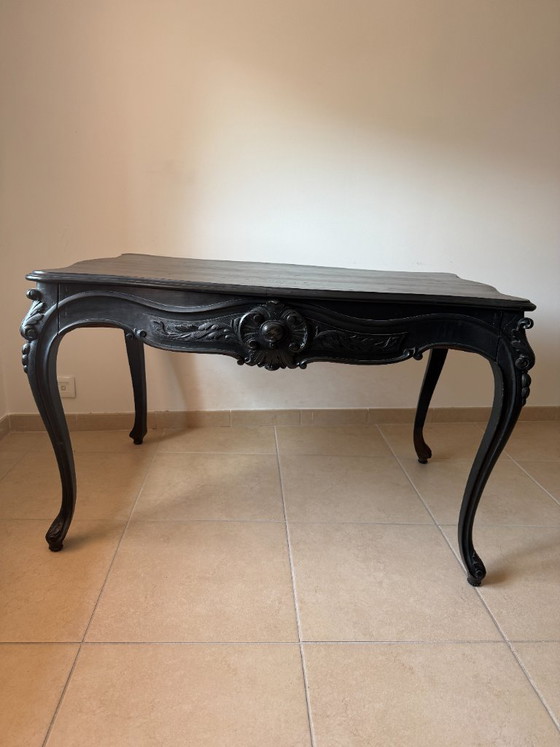 Image 1 of Mesa de comedor/escritorio de estilo barroco en madera de haya negra.
