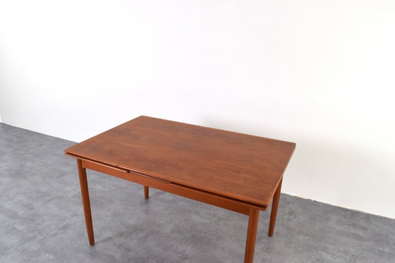 Image 1 of Table de salle à manger extensible en teck danois, style milieu du XXe siècle, années 1960.